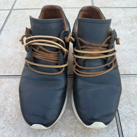 ESSEutESSE black leather sneakers